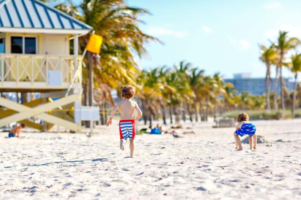 Two little boys having fun on a Florida beach.